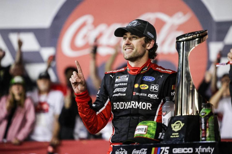 NASCAR Cup Series driver Ryan Blaney poses with the trophy in Winner’s Circle at the Coca-Cola 600 Charlotte Motor Speedway in Concord, N.C., on Monday, May 29, 2023.