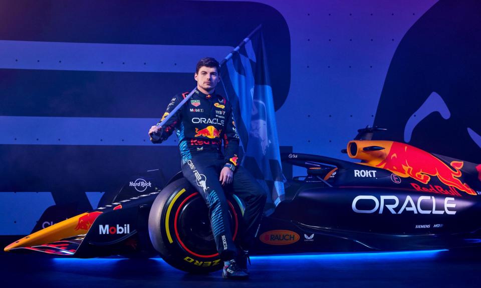 <span>Max Verstappen shows off Red Bull’s RB20 at the official launch on Thursday.</span><span>Photograph: Oracle Red Bull Racing/PA</span>