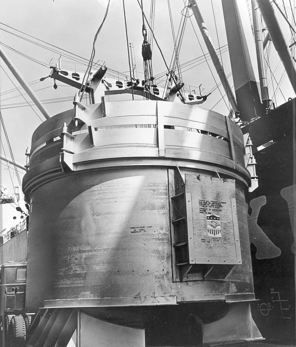 An Inductotherm Industries furnace is shipped overseas after its manufacture at the Westampton plant after owner Henry Rowan invented this type of induction furnace for microwave cold-smelting of metal.