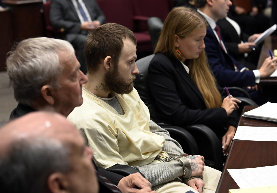 Michael Cummins sits with his attorneys during his court hearing at the Sumner County Justice Center on Wednesday, Aug. 16, 2023, in Gallatin Tenn. Cummins who killed eight people in rural Westmoreland over several days in April 2019, has pleaded guilty to eight counts of first-degree murder in exchange for a sentence of life without parole. (Mark Zaleski/The Tennessean via AP, Pool)