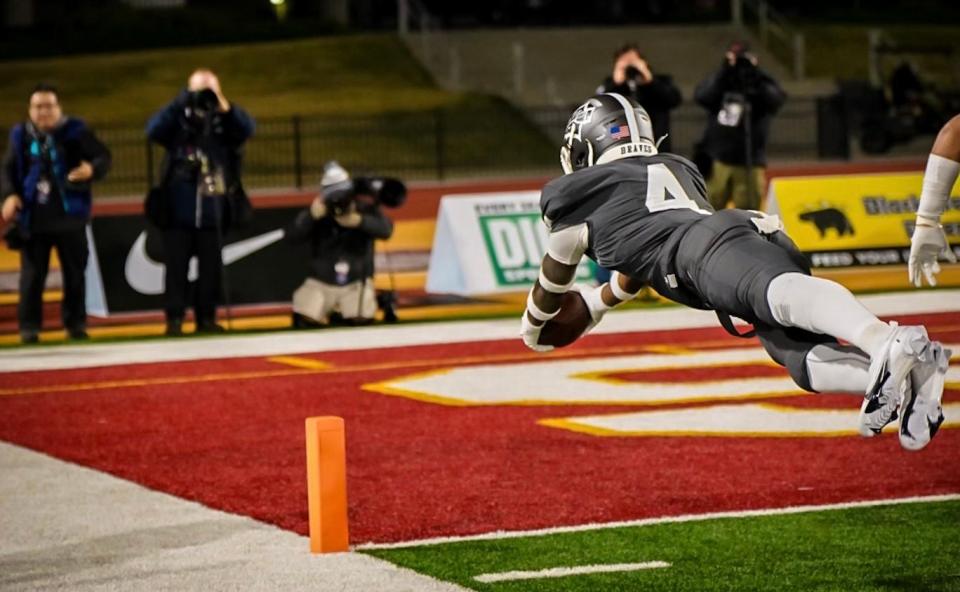 Louisville football signee Aaron Williams dives into the end zone to return an interception for a touchdown during a game Saturday, Dec. 10, 2022. Williams is a four-star defensive back prospect who played his senior season at St. John Bosco High School in California.