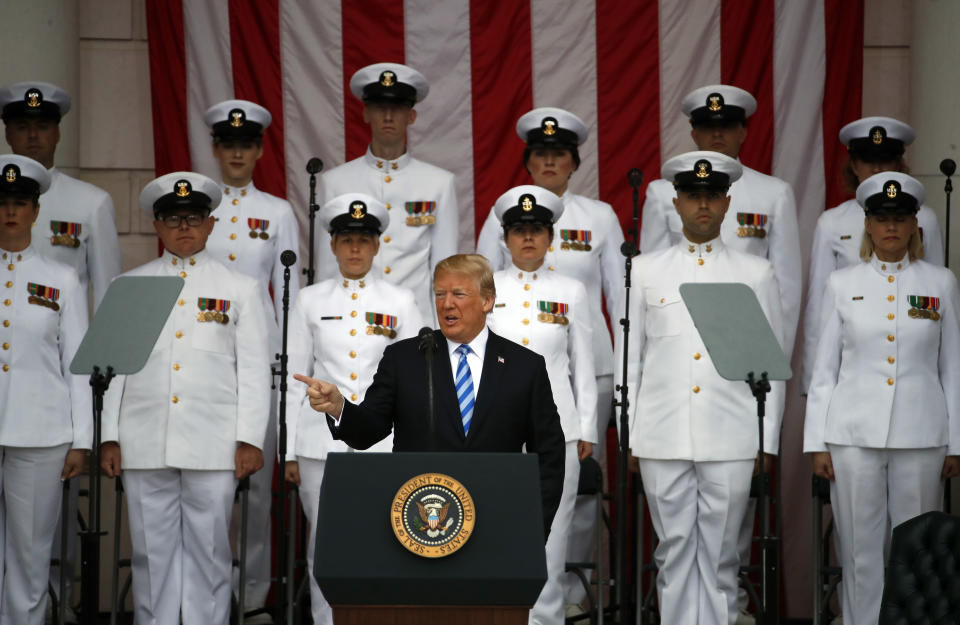 <p>President Donald Trump pauses at the podium as he arrives for a ceremony at the Memorial Amphitheater in Arlington National Cemetery on Memorial Day, Monday, May 28, 2018, in Arlington, Va.(Photo: Alex Brandon/AP) </p>