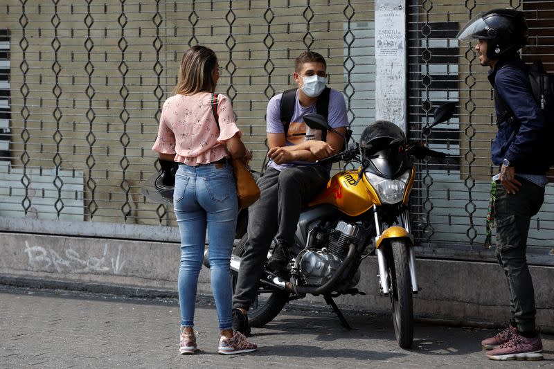 A man wears a protective mask in response to coronavirus (COVID-19) spread, in Caracas