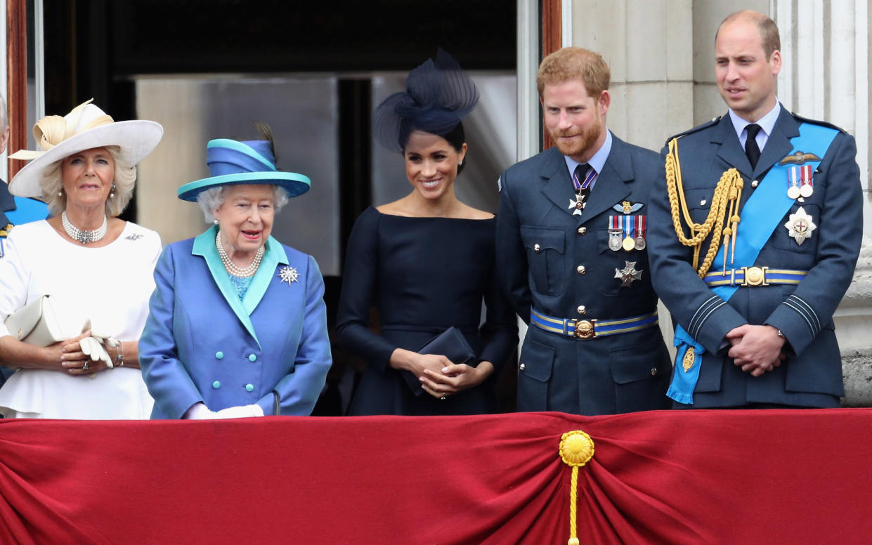 Image: Camilla, Duchess of Cornwall, Queen Elizabeth II, Meghan, Duchess of Sussex, Prince Harry, Duke of Sussex, and Prince William, Duke of Cambridge, on the balcony of Buckingham Palace in July 2018. (Chris Jackson / Getty Images file)