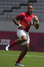 Great Britain's Dan Norton celebrates after scoring the first try in Great Britain's men's rugby sevens match against Canada at the 2020 Summer Olympics, Monday, July 26, 2021 in Tokyo, Japan. (AP Photo/Shuji Kajiyama)