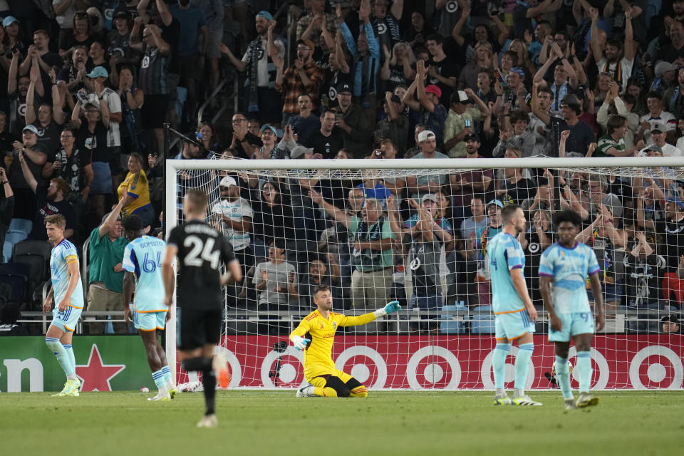 Colorado Rapids goalkeeper Marko Ilic, center, reacts after Minnesota's third goal during the first half of an MLS soccer match, Wednesday, Aug. 30, 2023, in St. Paul, Minn. (AP Photo/Abbie Parr)