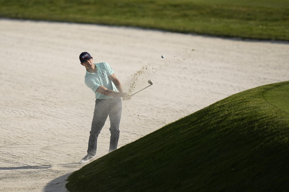 Billy Horschel hits out of a bunker on the 11th hole during the first round of the Players Championship golf tournament Thursday, March 9, 2023, in Ponte Vedra Beach, Fla. (AP Photo/Eric Gay)