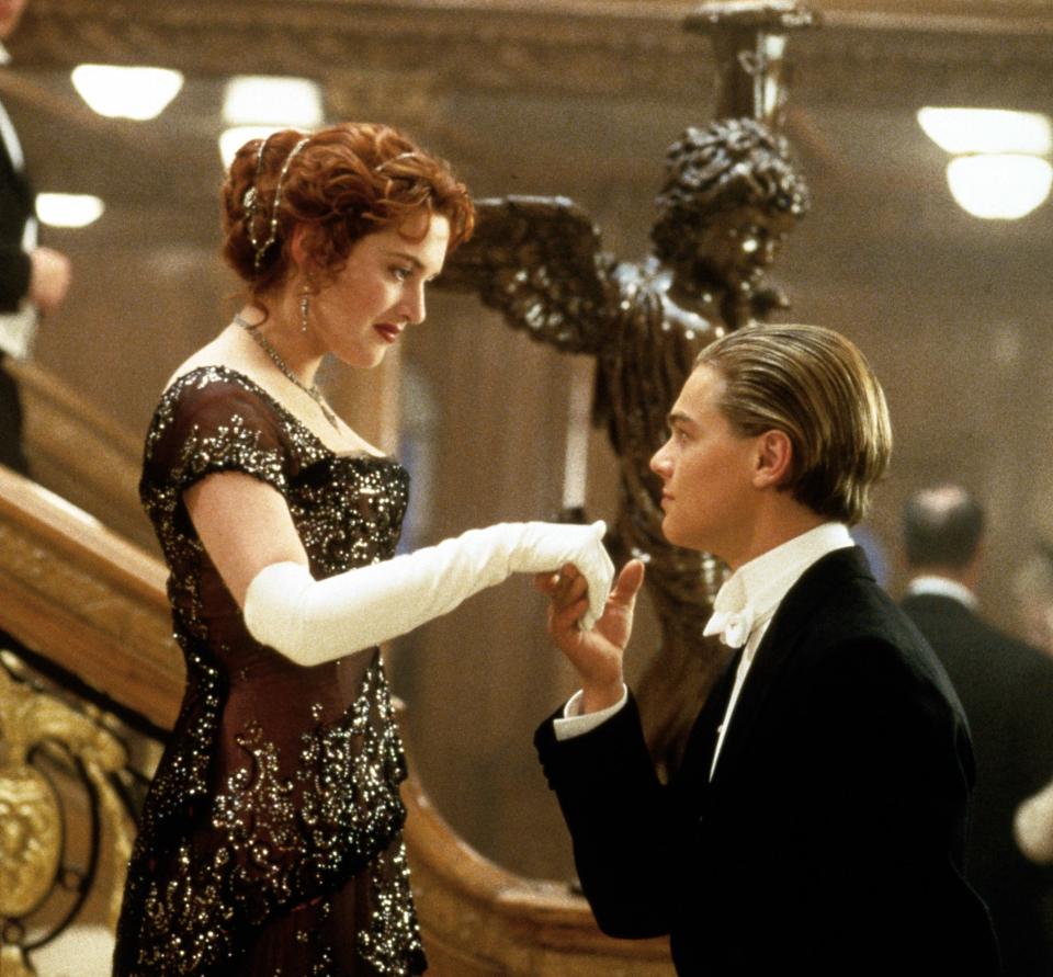 Leo DiCaprio kissing Kate Winslet's hand in Titanic