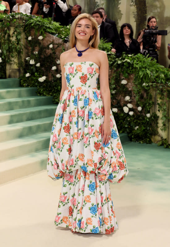 <p>Dia Dipasupil/Getty Images</p><p><em>Vogue</em>'s Director of Fashion Initiatives followed Wintour's lead with this sleeveless floral print gown. </p>