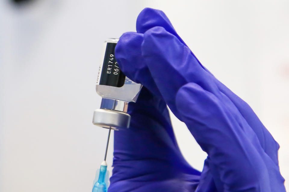 A NHS staff member prepares to administer the Pfizer and BioNTech vaccine. (Photo by Dinendra Haria / SOPA Images/Sipa USA)