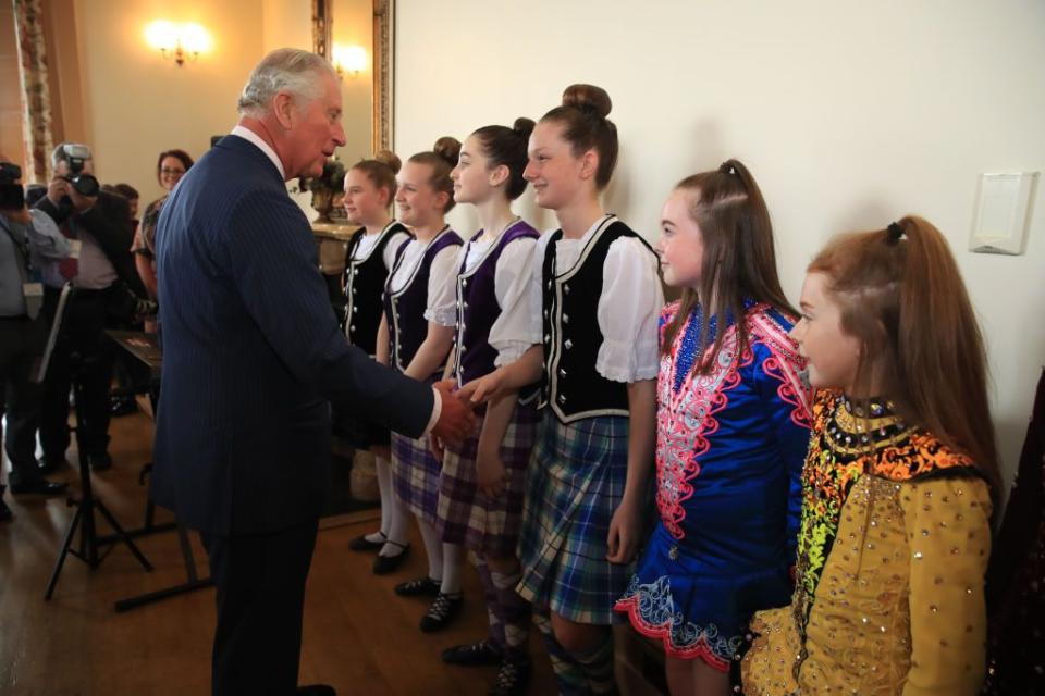 <p>A group of Irish dancers greet Prince Charles inside Brownlow House.</p>