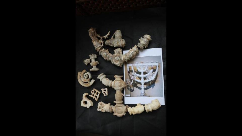 Archaeologists pieced together the menorah fragments from the site.