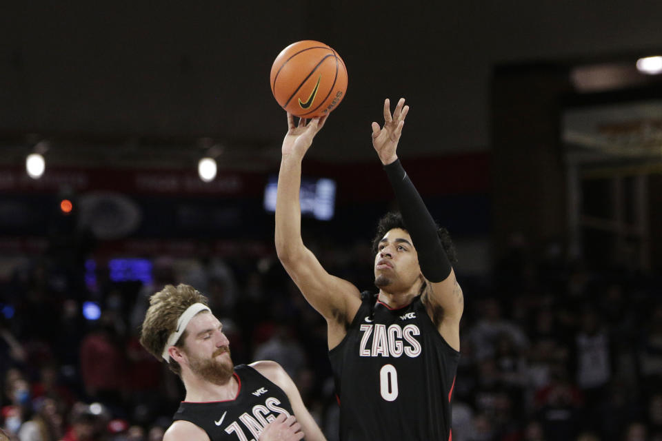 Gonzaga guard Julian Strawther, right, shoots next to forward Drew Timme during the first half of the team's NCAA college basketball game against Alcorn State, Monday, Nov. 15, 2021, in Spokane, Wash. (AP Photo/Young Kwak)