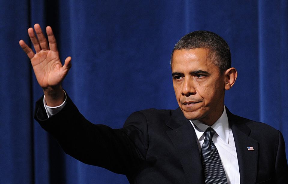 NEWTOWN, CT - DECEMBER 16: U.S. President Barack Obama waves after speaking at an interfaith vigil for the shooting victims from Sandy Hook Elementary School on December 16, 2012 at Newtown High School in Newtown, Connecticut. Twenty-six people were shot dead, including twenty children, after a gunman identified as Adam Lanza opened fire at Sandy Hook Elementary School. Lanza also reportedly had committed suicide at the scene. A 28th person, believed to be Nancy Lanza, found dead in a house in town, was also believed to have been shot by Adam Lanza. (Photo by Olivier Douliery-Pool/Getty Images)