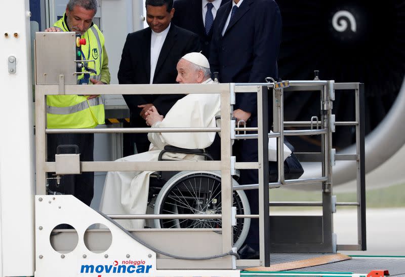 FILE PHOTO: Pope Francis boards a papal plane to travel to Bahrain, at Fiumicino International Airport near Rome