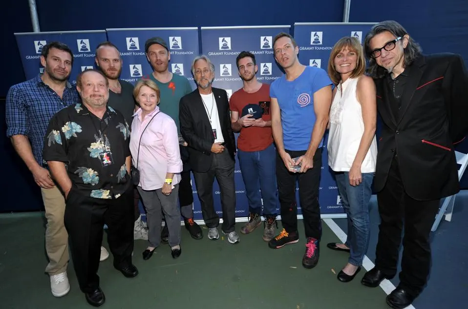 Coldplay y su ex manager Dave Holmes