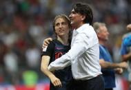 Soccer Football - World Cup - Semi Final - Croatia v England - Luzhniki Stadium, Moscow, Russia - July 11, 2018 Croatia's Luka Modric and coach Zlatko Dalic celebrate after the match REUTERS/Carl Recine