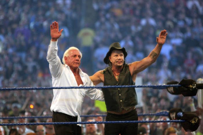 Ric Flair and Mickey Rourke salute the crowd at Wrestlemania 25