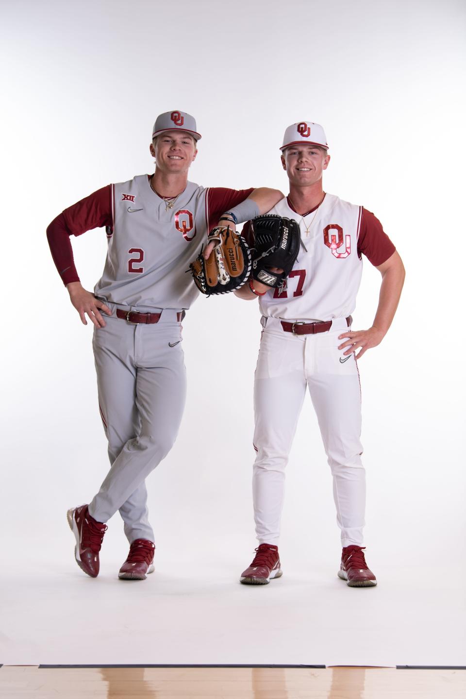 Easton (left) and Braden (right) Carmichael pose for a photo in their Oklahoma baseball uniforms.