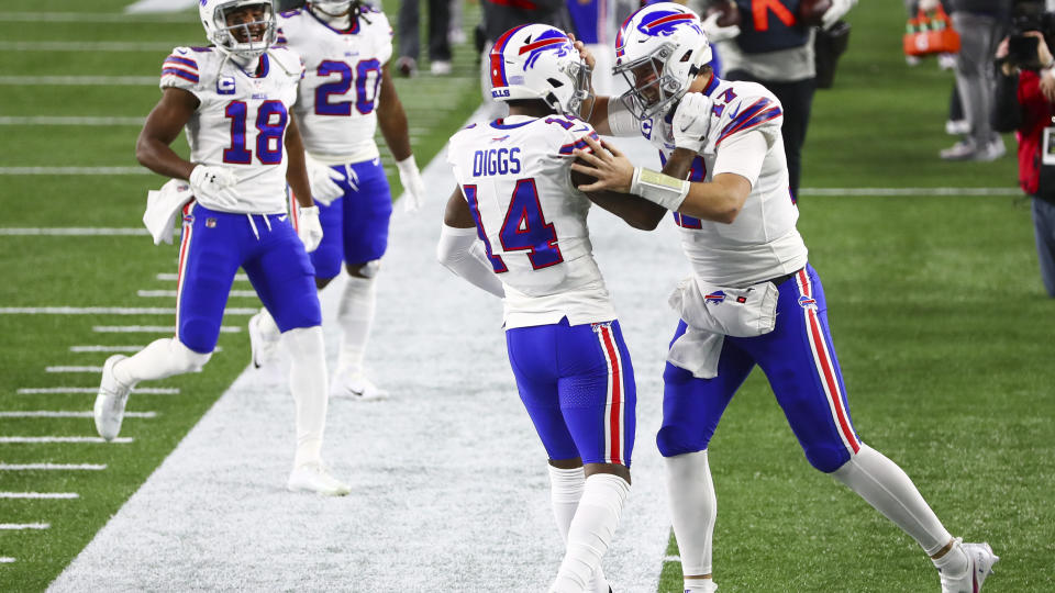 FOXBOROUGH, MA - DECEMBER 28: Josh Allen #17 celebrates with Stefon Diggs #14 of the Buffalo Bills after Diggs' touchdown during the first half against the New England Patriots at Gillette Stadium on December 28, 2020 in Foxborough, Massachusetts. (Photo by Adam Glanzman/Getty Images)