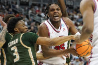 UAB's Tavin Lovan (3) tries to get the ball from Houston's Fabian White Jr. (35) during the first half of a college basketball game in the first round of the NCAA tournament, Friday, March 18, 2022, in Pittsburgh. (AP Photo/Keith Srakocic)
