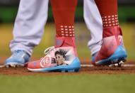 <p>Detailed view of the shoes of National League outfielder Bryce Harper (34) of the Washington Nationals which feature an image of late Miami Marlins pitcher Jose Fernandez before the 2017 MLB All-Star Game at Marlins Park. </p>