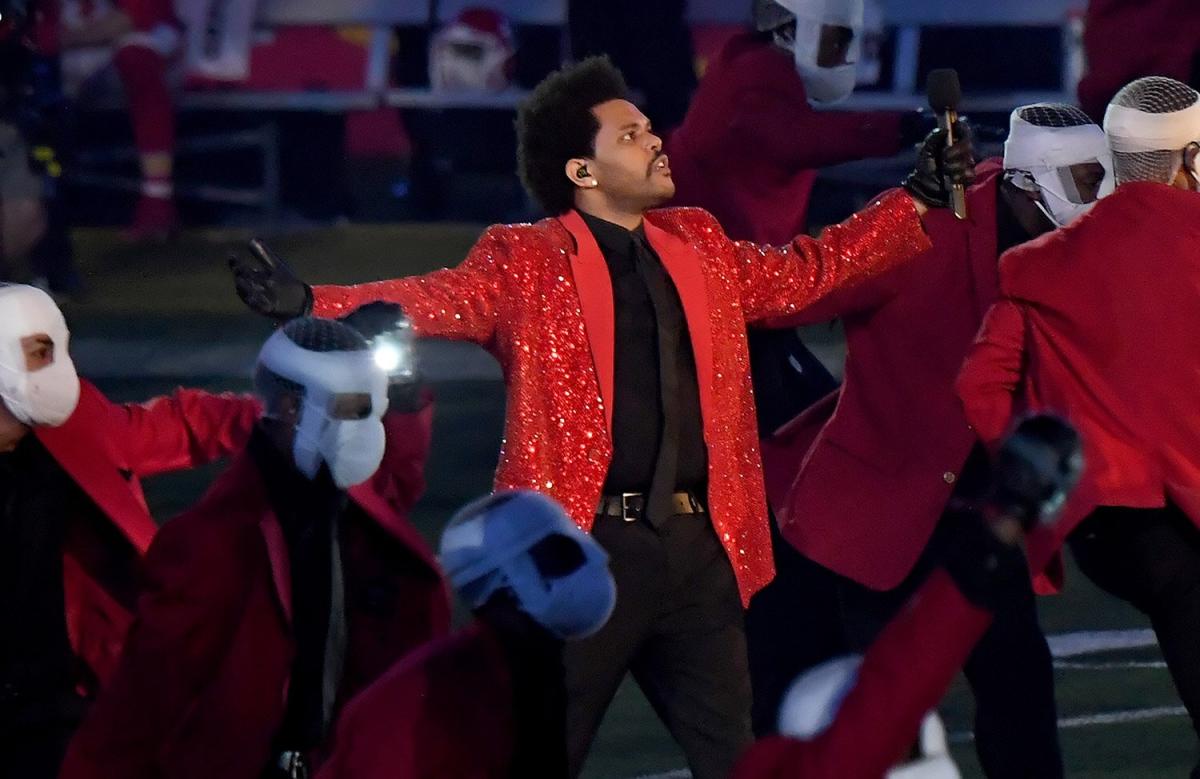 The Weeknd's Super Bowl Halftime Show Explained: The Meaning Behind the  Bandages and His 'After Hours' Era