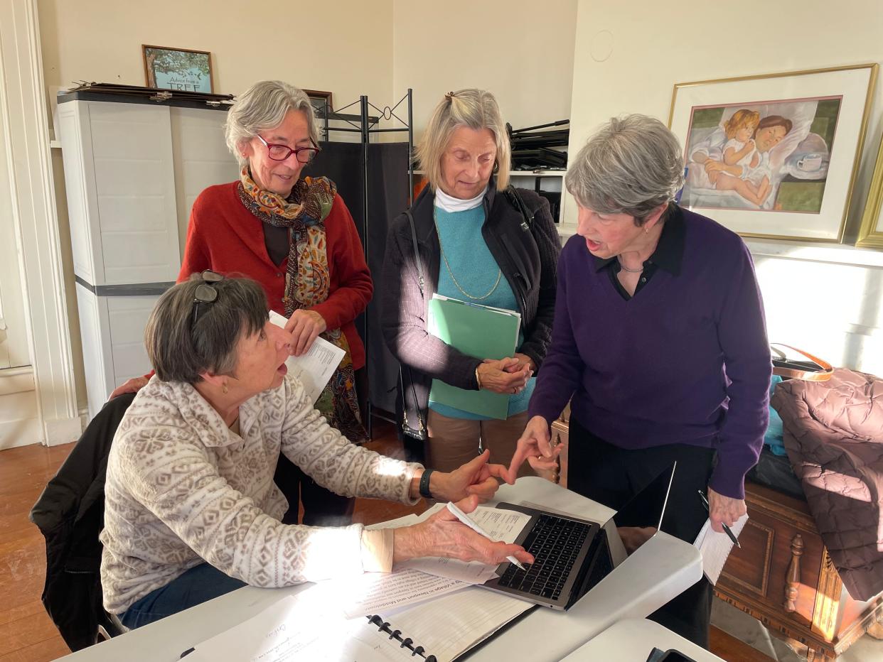 Greater Newport Village Steering Committee members (Left to Right) Sheila McEntee, co-chair; Judy Webb, Judi Tisdall and Joan Zuerner discuss plans for the new concept.
