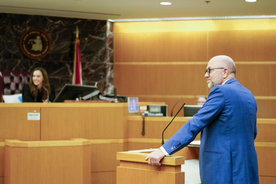 Defense attorney Bjorn Brunvand appears on behalf of his client, Tomasz Kosowski, a local plastic surgeon arrested in the death of missing Largo attorney, Steve Cozzi, during his first appearance in court in Clearwater, Fla., on Monday, March 27, 2023, remotely from the Pinellas County Jail. (Martha Asencio-Rhine/Tampa Bay Times via AP)