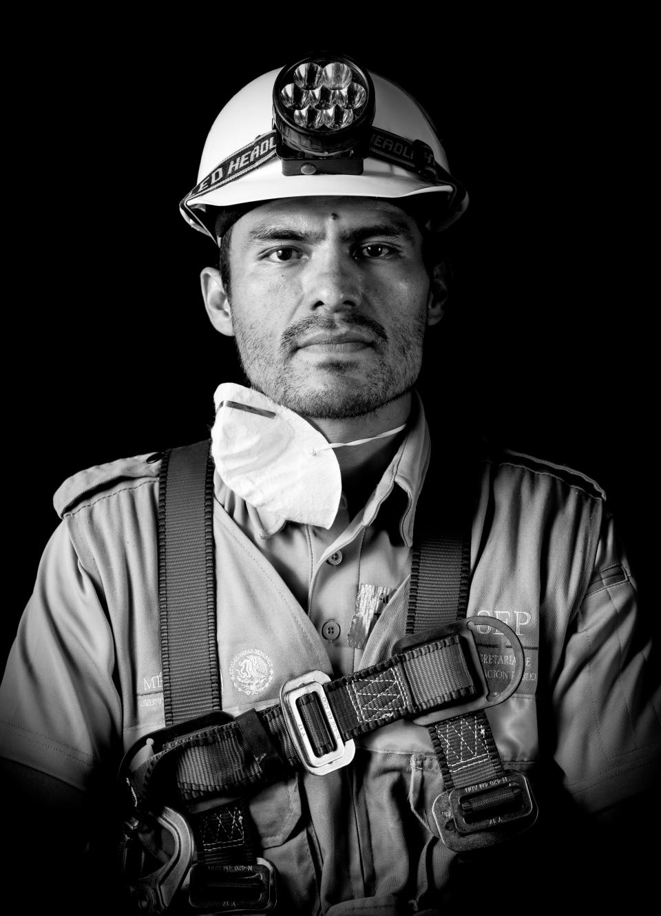 <p>Alejandro Torres, a systems engineer who volunteered as a rescuer after the 7.1 earthquake that hit Mexico on Sept. 19, poses for pictures in Mexico City on Sept. 25, 2017.”I don’t see chaos. I see a lot people organized by the heart,” Torres said during the photo shoot. (Photo: Omar Torres/AFP/Getty Images) </p>