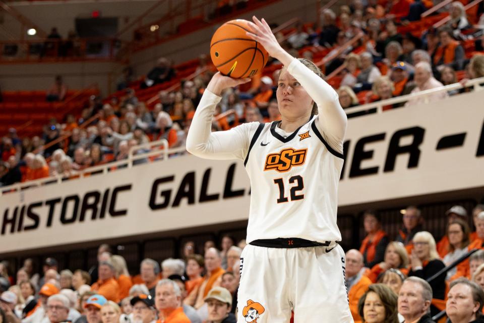 Jan 28, 2024; Stillwater, Okla, USA; Oklahoma State Cowgirls forward Lior Garzon (12) shoots a three point shot in the first half of a womenÕs NCAA basketball game against the Baylor Lady Bears at Gallagher Iba Arena. Mandatory Credit: Mitch Alcala-The Oklahoman