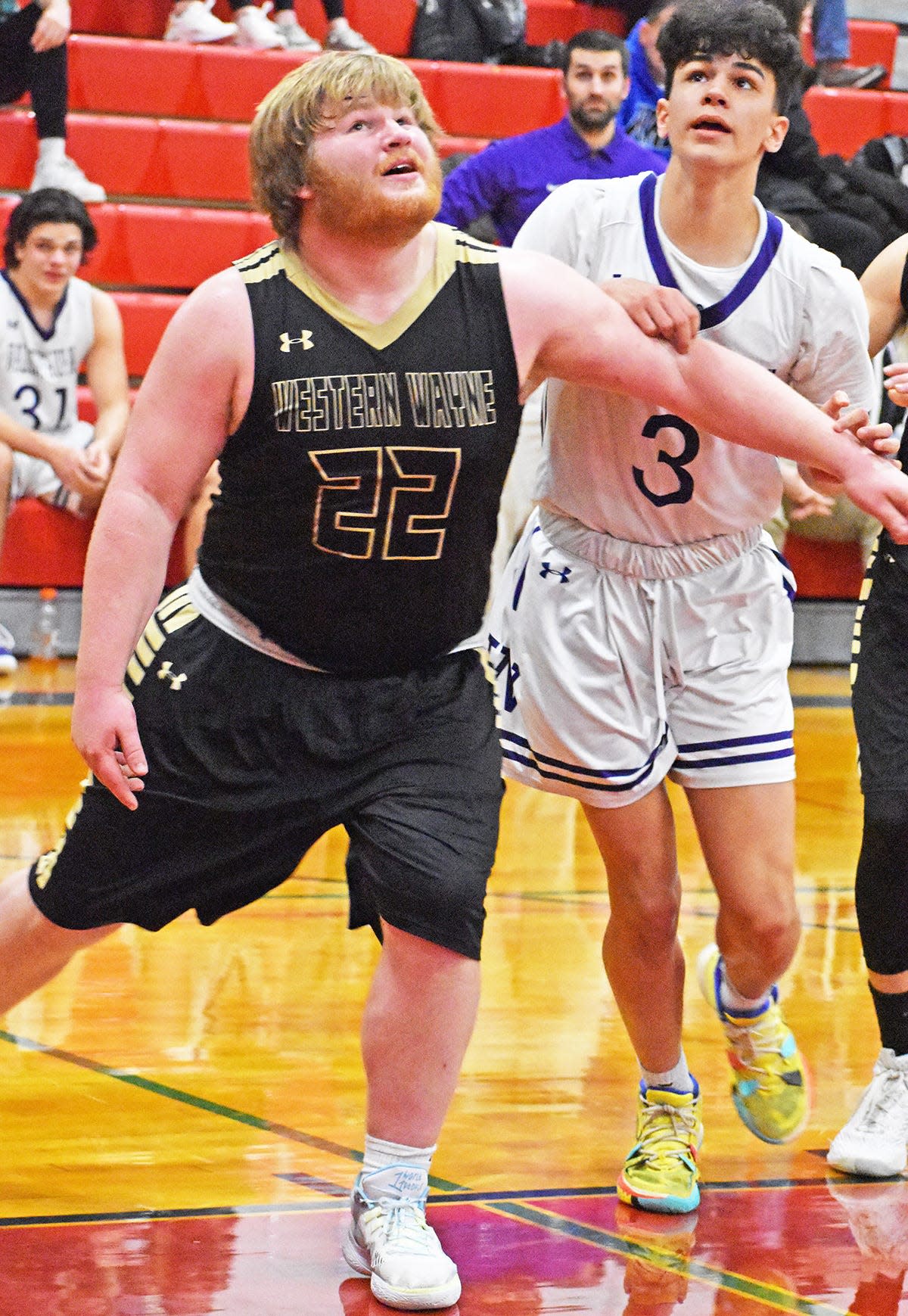 Western Wayne senior Kyle Guarino (22) boxes out during action at the 62nd Annual Honesdale Area Jaycees Tournament.