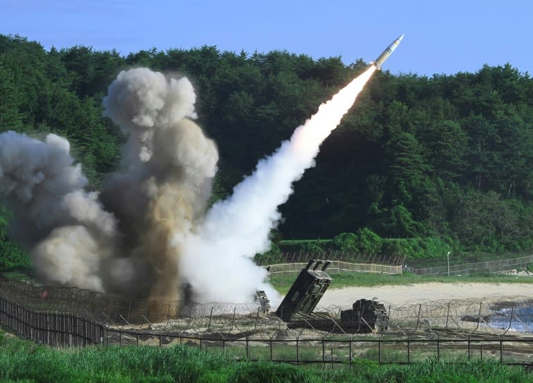 A US M270 Multiple Launch Rocket System fires an MGM-140 Army Tactical Missile into the East Sea from an undisclosed location on South Korea's east coast during a drill on July 5, 2017