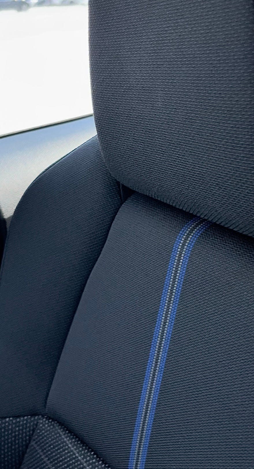 The blue and black seats in the 2022 Toyota Corolla.