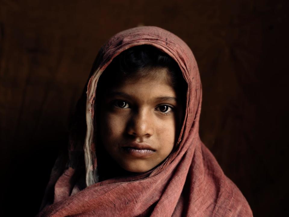 Yalina, 5, a beneficiary of the Ravi river slums school is forbidden from walking the streets as her father fears for her safety (Paddy Dowling)