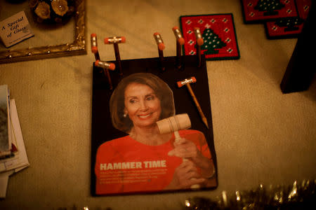 A picture of House Democratic leader Nancy Pelosi (D-CA) is seen at a memorabilia shop as the partial U.S. government shutdown enters its third week in Washington, U.S., January 11, 2019. REUTERS/Carlos Barria