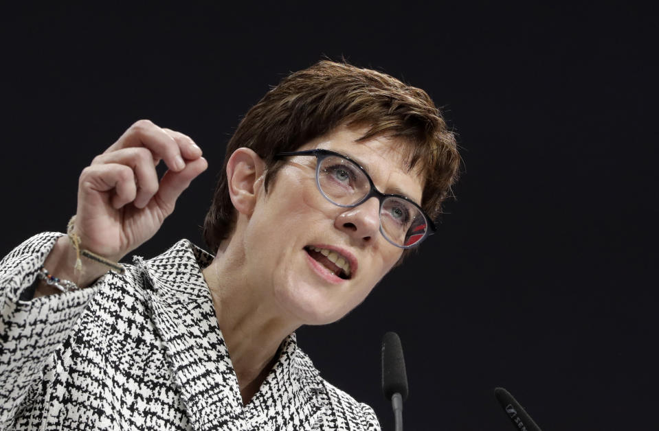 CDU general secretary Annegret Kramp-Karrenbauer delivers her speech when running as chairwoman at the party convention of the Christian Democratic Party CDU in Hamburg, Germany, Friday, Dec. 7, 2018. 1001 delegates are electing a successor of German Chancellor Angela Merkel who doesn't run again for party chairmanship after more than 18 years at the helm of the party. (AP Photo/Michael Sohn)