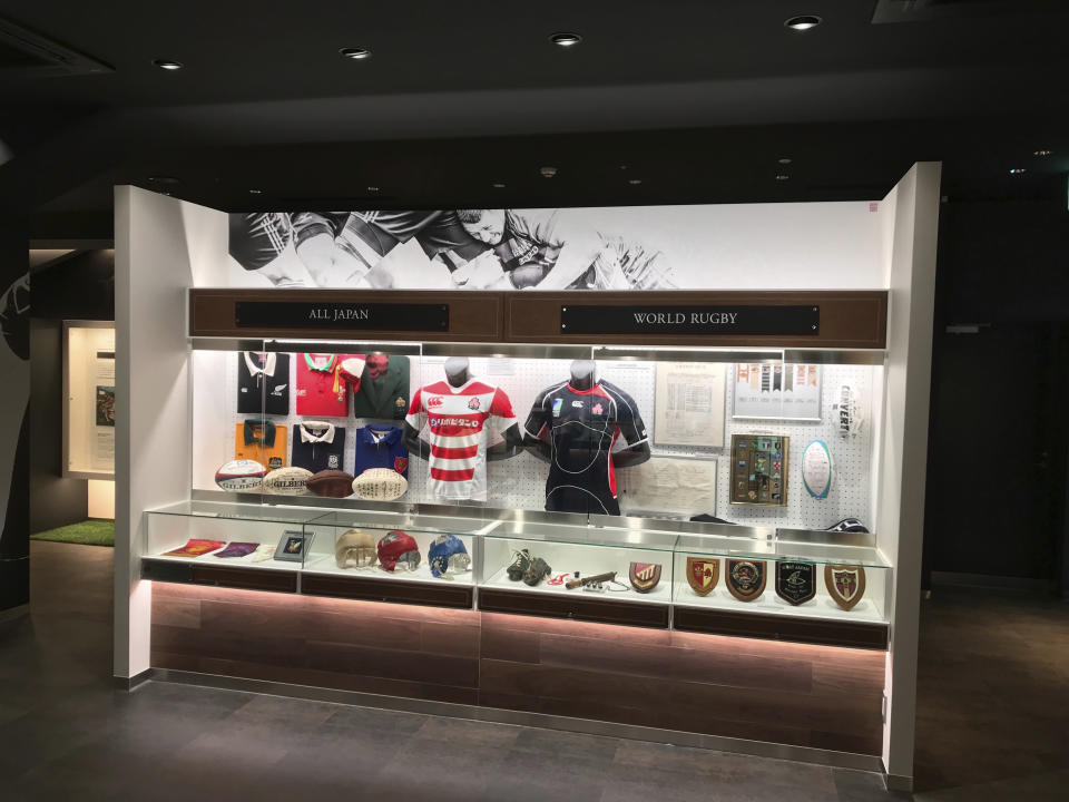 In this Friday, Oct. 26, 2018, photo, a display features items from Japan’s national team as well as international rugby at the rugby museum of Hanazono Stadium in Higashiosaka, western Japan. Built in 1929, Hanazono is the oldest dedicated rugby venue in the country. Modeled after Twickenham Stadium in England, Hanazono Stadium boasts a rugby museum and has been selected as one of 12 venues for next year's tournament. (AP Photo/Jim Armstrong)