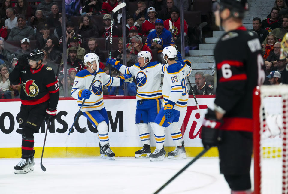Buffalo Sabres left wing Jeff Skinner, center, celebrates a goal against the Ottawa Senators with teammates during the first period of an NHL hockey game Tuesday, Oct. 24. 2023, in Ottawa, Ontario. (Sean Kilpatrick/The Canadian Press via AP)