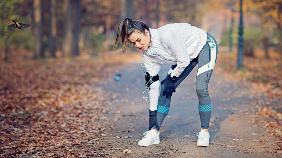 Runner holding leg