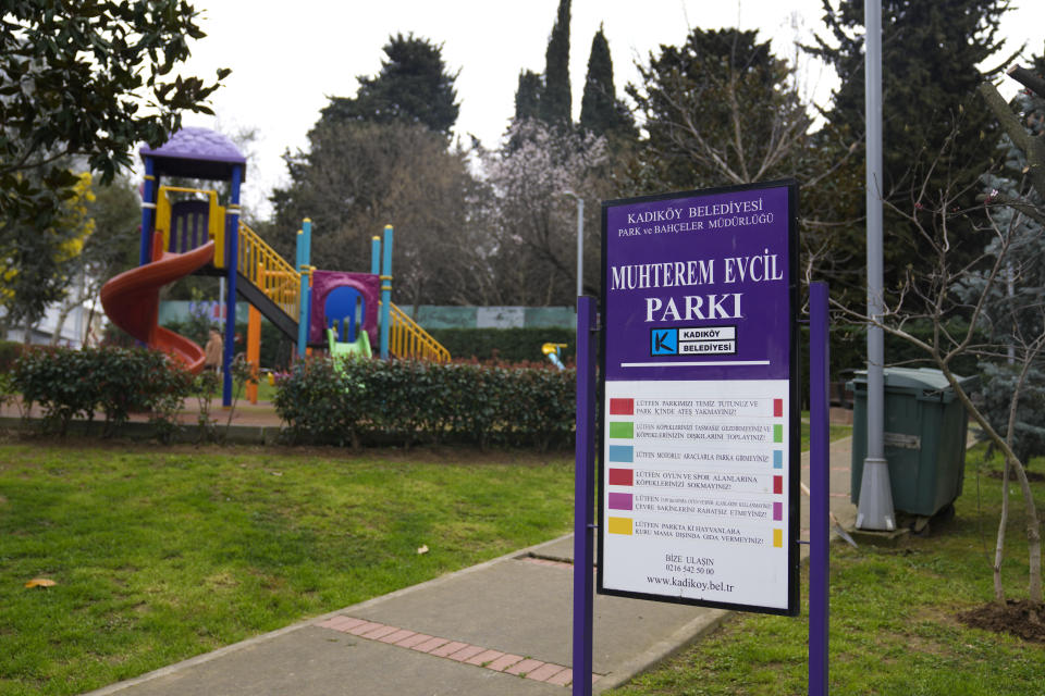 A sign places at the entrance of a small park carries the name of the late Muhterem Evcil, in Istanbul, Turkey, Wednesday, March 6, 2024. Muhterem Evcil was stabbed to death by her estranged husband at her workplace in Istanbul, where he had repeatedly harassed her in breach of a restraining order. More than a decade later, her sister believes Evcil would still be alive if authorities had enforced laws on protecting women and jailed him. (AP Photo/Khalil Hamra)