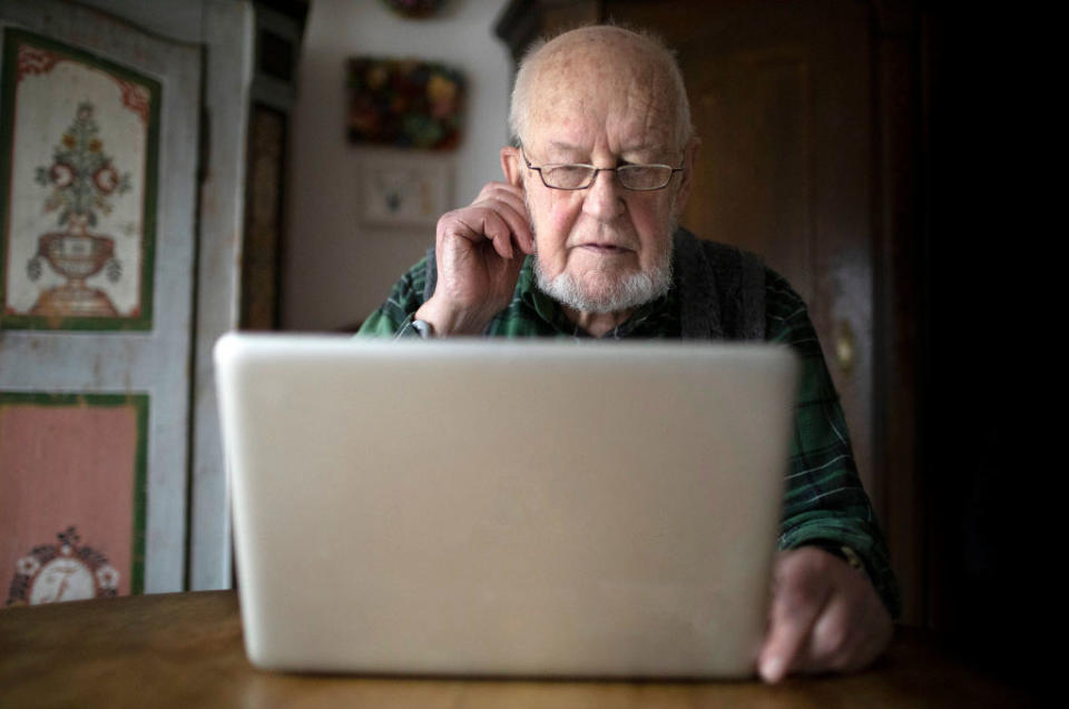 a man at a laptop