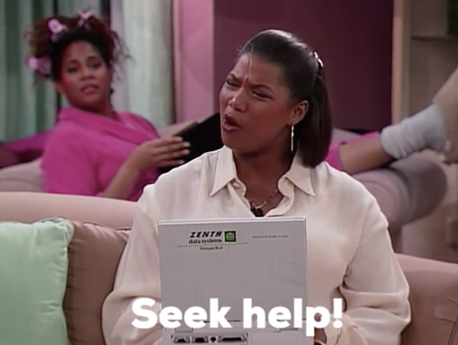 Khadijah James from "Living Single" on her computer, saying, "Seek help!"