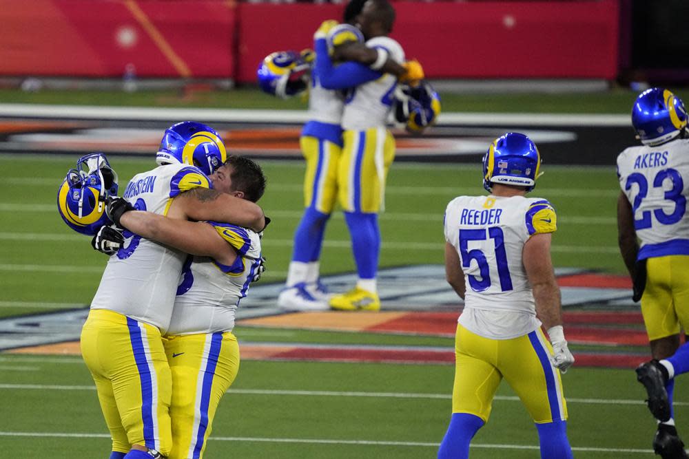 Los Angeles Rams celebrate during the second half of the NFL Super Bowl 56 football game against the Cincinnati Bengals Sunday, Feb. 13, 2022, in Inglewood, Calif. (AP Photo/Julio Cortez)