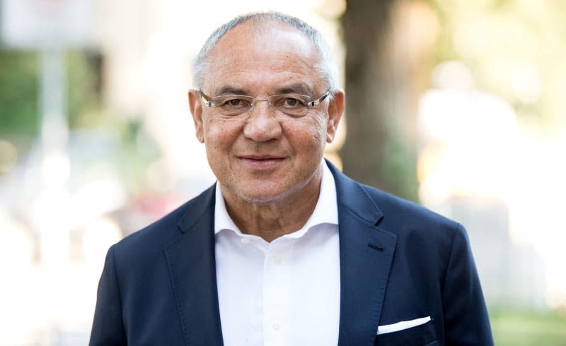 Soccer coach Felix Magath poses for a picture in a cafe. Former Bayern Munich coach Felix Magath has suggested himself as a solution to the club's floundering search for a new manager, but he may have been half joking. Sven Hoppe/dpa