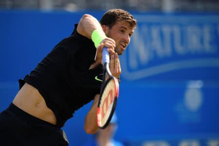 Britain Tennis - Aegon Championships - Queen’s Club, London - June 21, 2017 Bulgaria's Grigor Dimitrov in action during his second round match against France's Julien Benneteau Action Images via Reuters / Tony O'Brien