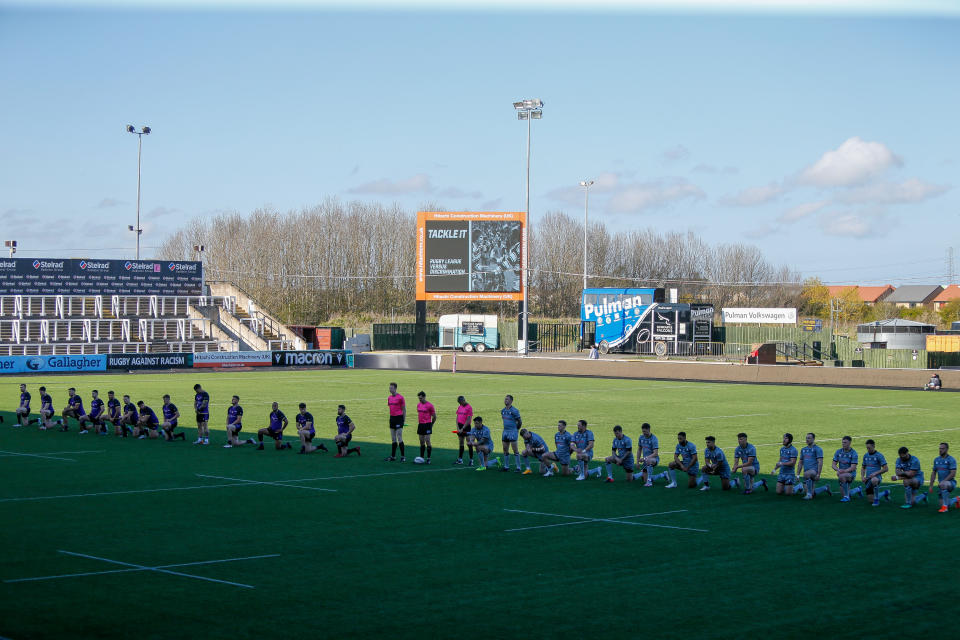 <p>Players take a knee against racism before the BETFRED Championship match between Newcastle Thunder and Sheffield Eagles at Kingston Park, Newcastle, England on 25th April 2021.  (Photo by Chris Lishman/MI News/NurPhoto via Getty Images)</p>
