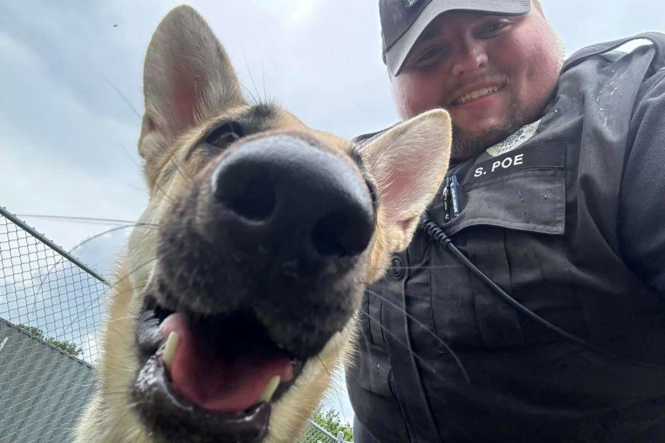 <p>IMPD Northwest District </p> Abby the German Shepherd and Officer Poe