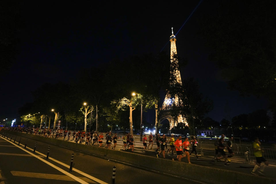 Amateur runners race like Olympians along the same iconic route as