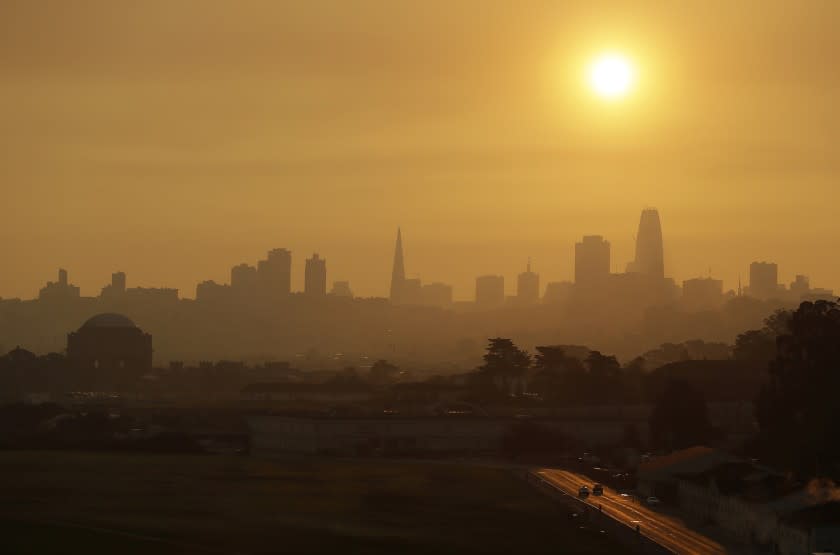 Smoke and haze from wildfires hovers over the skyline Thursday, Oct. 12, 2017, in San Francisco. Gusting winds and dry air forecast for Thursday could drive the next wave of devastating wildfires that are already well on their way to becoming the deadliest and most destructive in California history. (AP Photo/Eric Risberg)